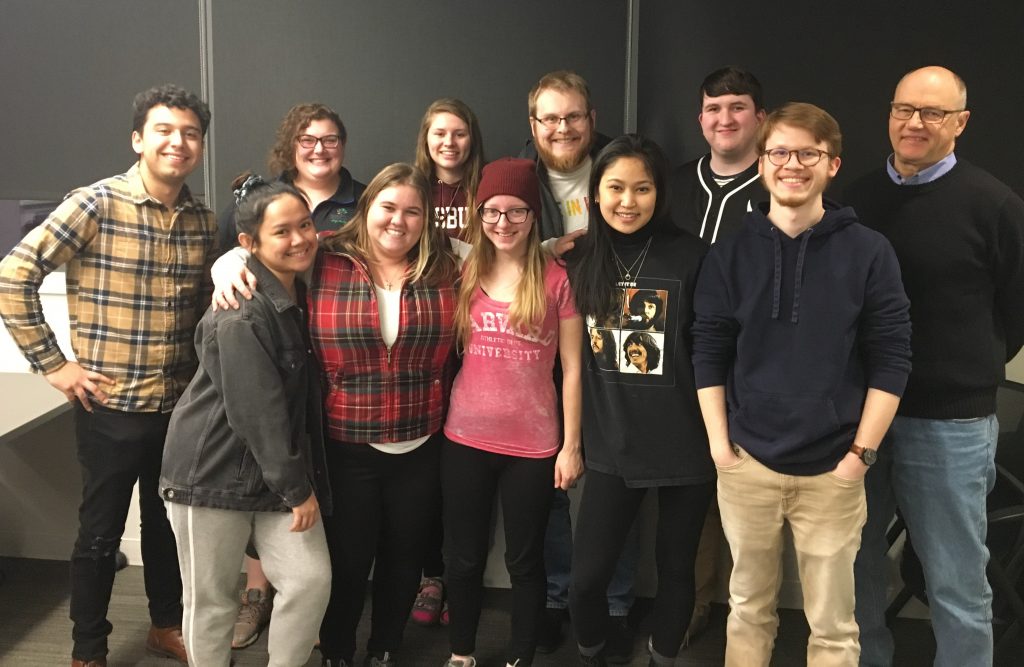 Group photo of 2019-20 Christensen Scholars with Professor Mark Tranvik